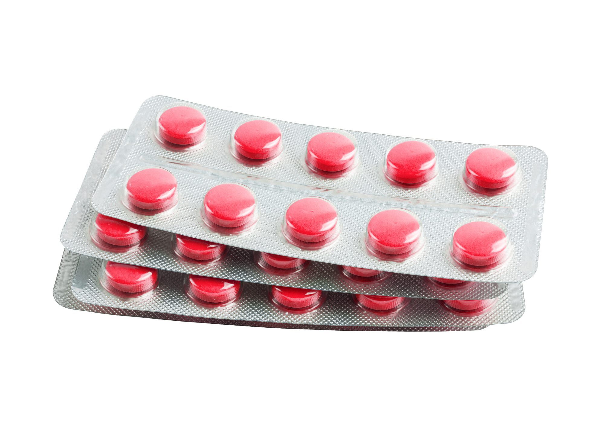Three packs of pills are shown in a pile.